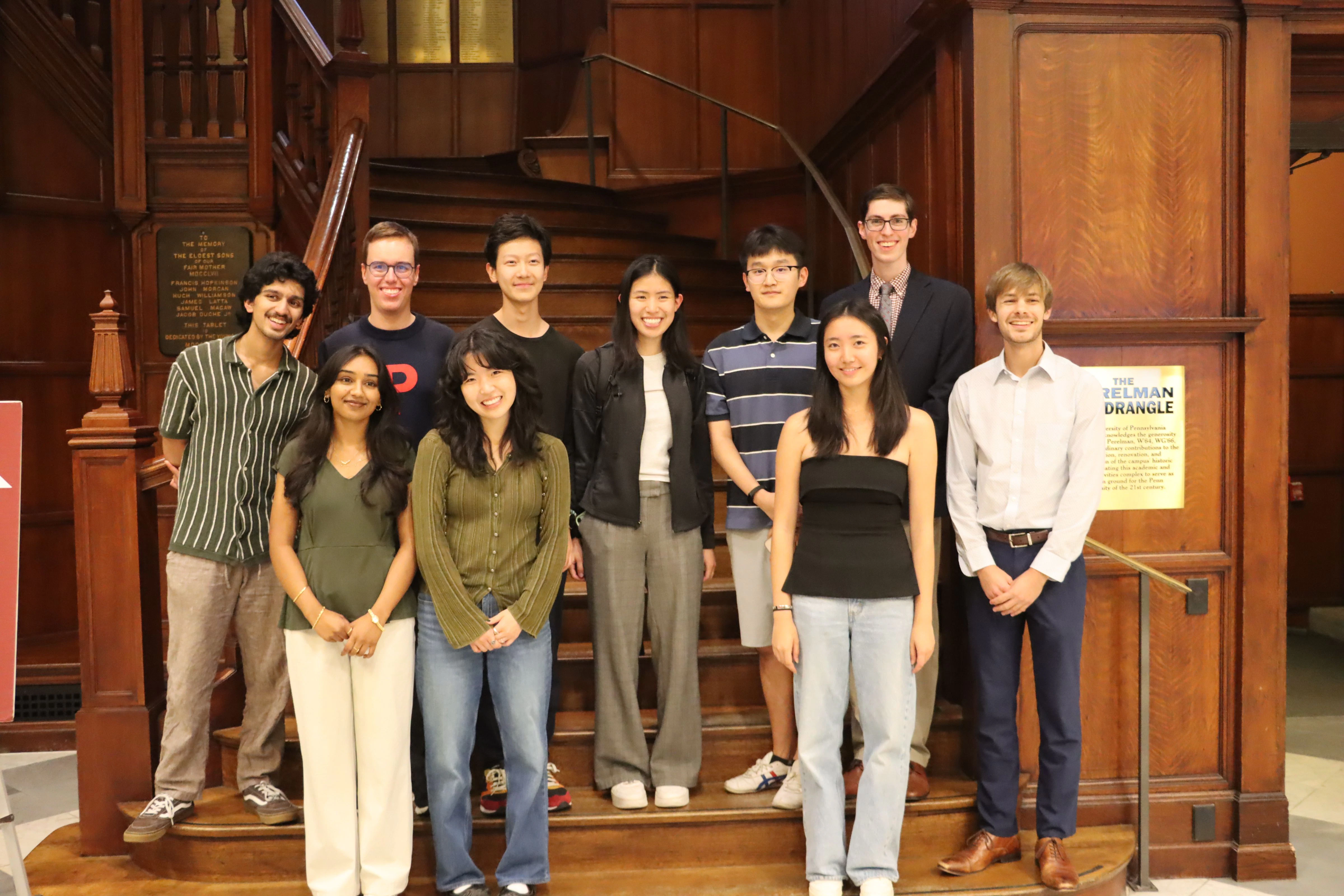 CURF students standing in a group on the stairs